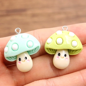 Cute resin mushroom charms in mint and light green with silver metal loops