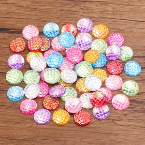 Macro detail of colorful fish scale resin cabochons for DIY jewelry making and crafts