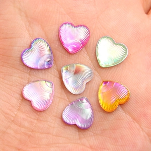 Iridescent heart-shaped acrylic beads with radiant shell texture for DIY crafts