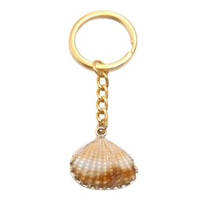 Golden acrylic shell and starfish pendant keychain with natural ocean textures
