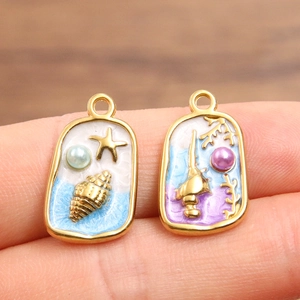 Pendentifs océaniques en acier inoxydable doré avec hippocampes et étoiles de mer