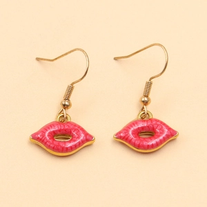 Close-up of pink enamel lip pendants in gold plated 304 stainless steel for earrings