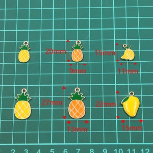 DIY KC gold fruit enamel charms featuring pineapple banana and mango pendants