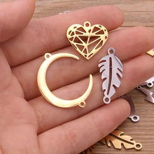 Polished stainless steel DIY jewelry connectors in heart, moon, and feather shapes