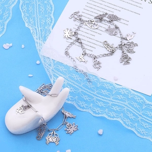 Marine life themed stainless steel bracelets with octopus, crab, and seahorse charms