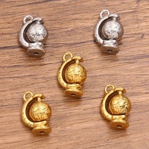 Set of rotating 3D globe charms in gold and silver finish for DIY jewelry