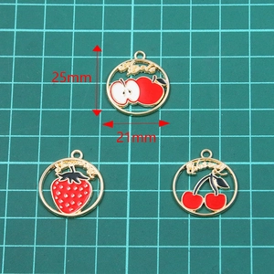 Three-piece gold fruit enamel charms featuring apple, strawberry, and cherry motifs