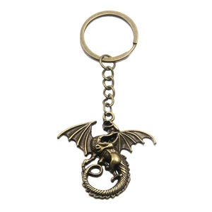 Porte-clés pendentif dragon volant en bronze antique avec textures d'écailles détaillées