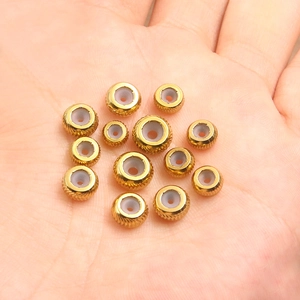 Goldene Schiebeperlen aus Edelstahl mit Silikonkern für DIY-Schmuckhalsketten
