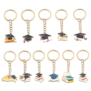 Enamel graduation theme keychains featuring mortarboards and diplomas in multiple styles