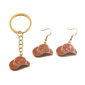 Golden cowboy hat charm jewelry set with keychain and hook earrings in brown enamel