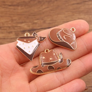 DIY cowboy enamel charms including star bandana and western hats for jewelry making