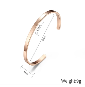 Detail showing 4mm rose gold titanium cuff dimensions and brushed metal texture
