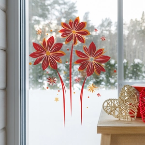 Vibrant red and orange firework window stickers displayed against a snowy forest background