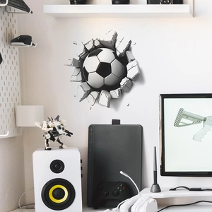 3D football wall decal showing a soccer ball breaking through wall for room decor