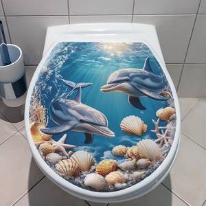 3D ocean theme toilet lid decal featuring vivid dolphins and shells in a blue underwater world
