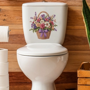 Self-adhesive floral basket wall sticker on white toilet tank with pink flowers and bow