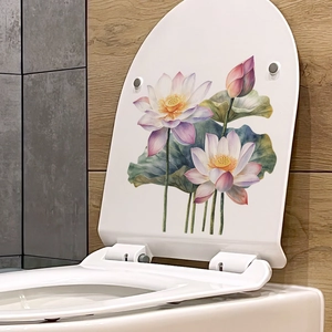 Sticker lotus à l'aquarelle sur un abattant de WC blanc dans une salle de bain moderne