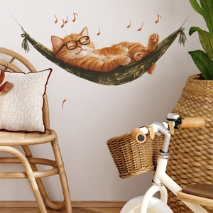 Cute orange cat in a green hammock wall decal for cozy bedroom or living room decoration
