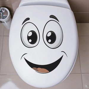 Funny big eyes cartoon toilet seat sticker with a large smiling face for bathroom decor