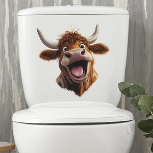 Funny Highland Cow decal on white toilet lid with brown fur and laughing expression