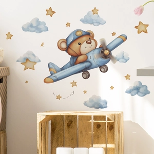 Cartoon bear pilot flying a blue plane wall decals with soft stars and clouds stickers