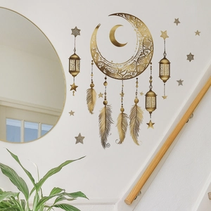 Golden boho wall decals featuring moon, stars and feathers in a cozy home setting