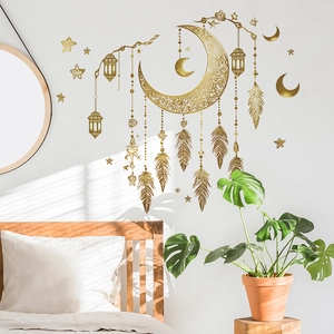 Golden moon and feather wall sticker for Ramadan home decor in a cozy bedroom