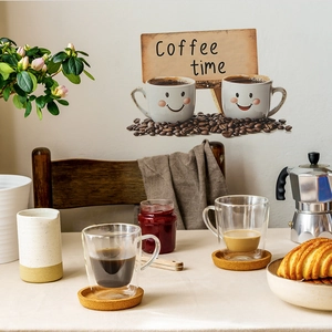 Double-walled glass coffee mug set with cork coasters in a lifestyle breakfast scene