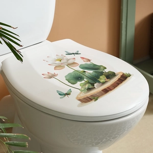 Chinese style lotus flower wall sticker on a white toilet lid with dragonflies