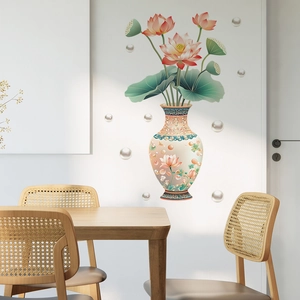 Detail of 3D vase wall sticker with red lotus flowers and pearl accents in a dining room