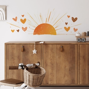 Boho sun and hearts wall decals in warm orange tones for cozy bedroom and nursery decor