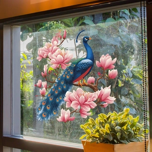 Artistic window film featuring a blue peacock on blooming pink magnolia branches