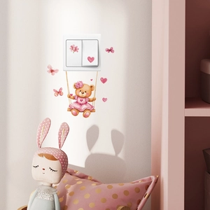 Cute cartoon brown bear on a swing wall sticker with pink hearts and butterflies for bedroom