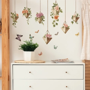 Watercolor floral wall stickers with hanging gold planters and colorful butterfly decals