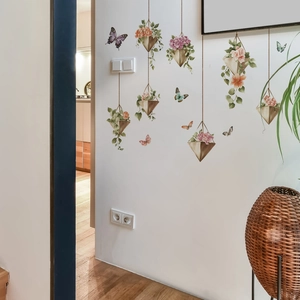Floral wall stickers with hanging geometric baskets and colorful butterflies for decor