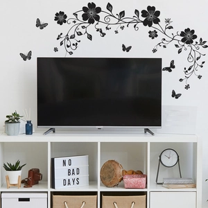 Elegant black floral vine and butterfly wall sticker for modern living room decor