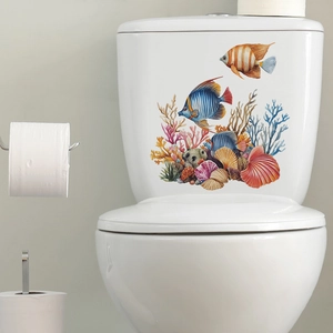 Detailed watercolor ocean life decals featuring colorful tropical fish and corals on a toilet tank