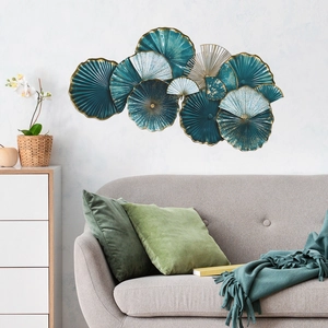 Luxe 3D embossed floral wall decor with blue and gold metal lotus leaf patterns