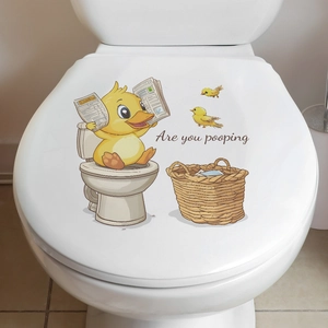 Canard jaune de dessin animé lisant un journal autocollant de décoration de siège de toilette