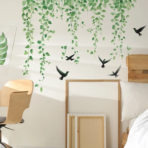 Fresh green hanging vine wall decals with black birds for minimalist bedroom decor
