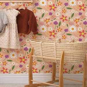 Sticker mural floral avec marguerites blanches et fleurs colorées sur fond rose orangé