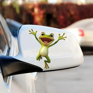Funny green frog window decal applied on a car side mirror for creative decoration