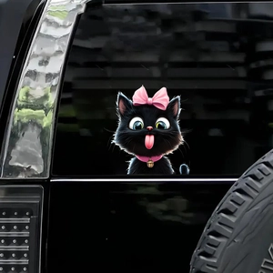 Cute black cat car sticker with pink bow and golden bell on a glass window