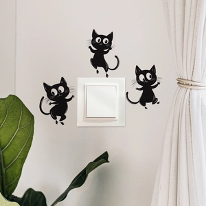 Three black mischievous cartoon cat wall stickers for light switch and home decor