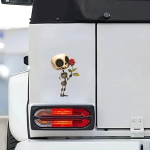 3D cartoon skeleton holding red rose decal on car trunk, creative automotive window sticker