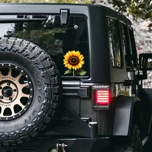 UV resistant sunflower vinyl decal sticker applied to a black SUV rear window glass