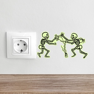 Glow-in-the-dark skull wall stickers for light switches featuring creative cartoon designs