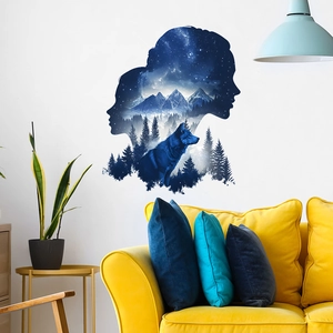 Artistic double exposure wall decal with silhouettes of snowy mountains and a blue wolf