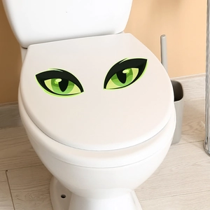 Stickers yeux verts lumineux pour décoration créative de siège de toilette et salle de bain